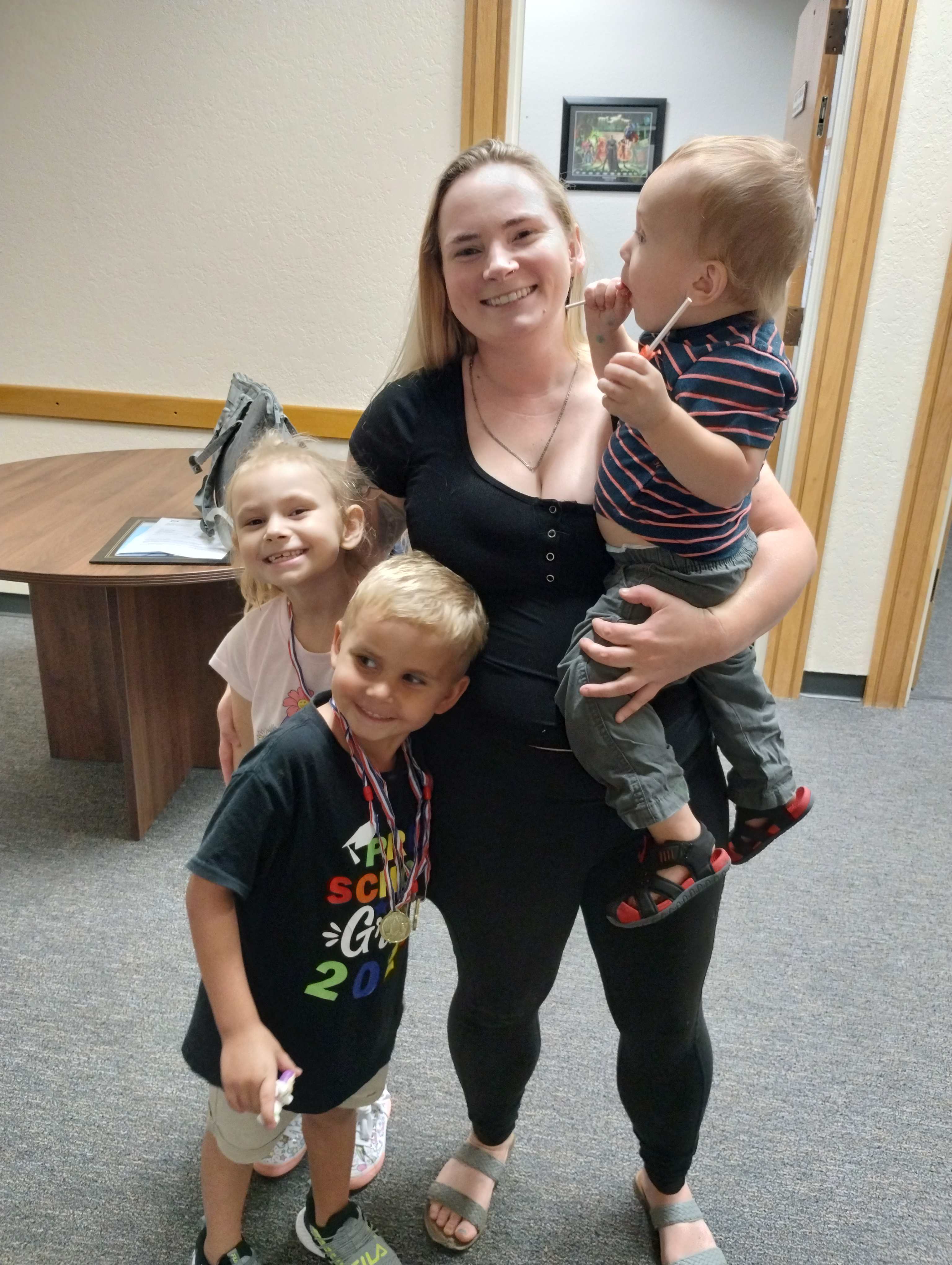 Mother with children in Judge Pinckett's office